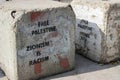 Blockade on a road between the occupied palestinian territoryÃ¢â¬â¢s in the West Bank or Gaza and Israel bearing a clear message